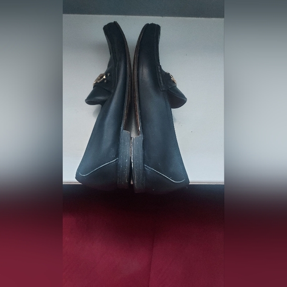 Salvatore Ferragamo Black and Gold Loafers with Signature Hardware. - Picture 9 of 9